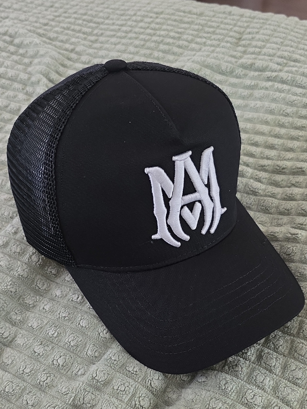 AMIRI Black Trucker Hat‎ with White Monogram
